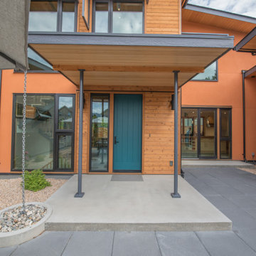 Custom solar shade eyebrows over exterior windows