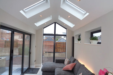 Photo of a contemporary home design in West Midlands.