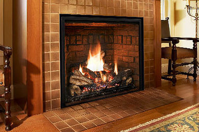 Tuscan living room photo in New York with a standard fireplace
