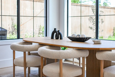 Example of a transitional dining room design in Houston