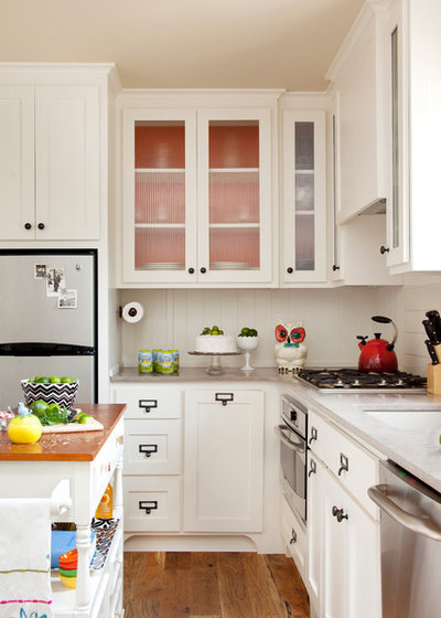 Eclectic Dining Room by Bret Franks Construction, Inc.