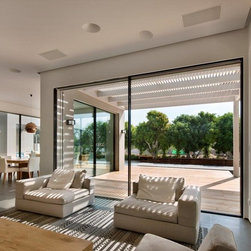 Contemporary Home with Invisible Sliders - Windows And Doors
