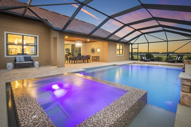 Example of a large transitional indoor concrete paver and rectangular lap hot tub design in Miami