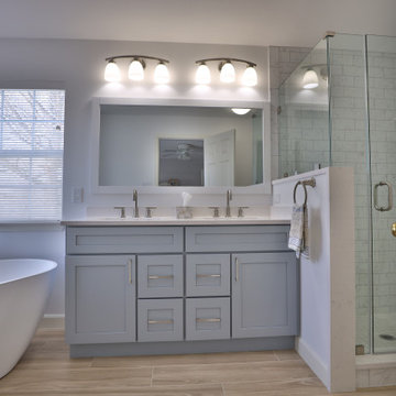 Spacious Bathroom with Dual Vanity and Freestanding Tub