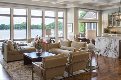 Example of a mid-sized transitional formal and enclosed dark wood floor and brown floor living room design in Chicago with beige walls, no fireplace and a tv stand