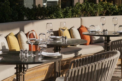 Patio - modern patio idea in Other