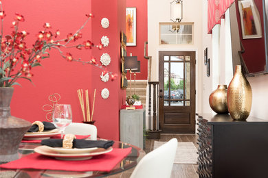 Mid-sized trendy porcelain tile dining room photo in Austin with red walls and no fireplace