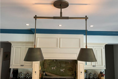 Example of a trendy kitchen design in Philadelphia with an island