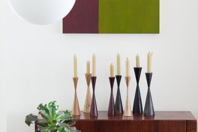 Transitional dark wood floor dining room photo in New York with white walls