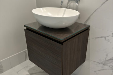 Design ideas for a contemporary cloakroom in Hampshire.
