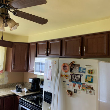 cabinet refacing-----dark wood with granite countertop