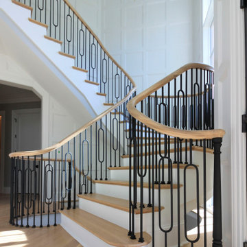 Project #95 | Freestanding Elliptical Staircase with Geometric Iron Balusters