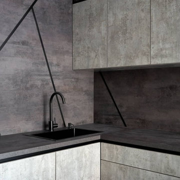 Дизайнерская угловая кухня серого цвета в стиле лофт с барной стойкой