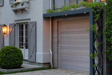 French country beige three-story stucco house exterior idea in New York