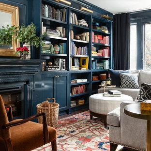 Inspiration for a small traditional family room in Toronto with blue walls, a standard fireplace and carpet.