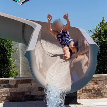 Paradise Slides Model PS52L-C project by Quality Pool Construction