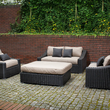 Toja Patio Furniture - Tuscan Love Seat Set - Red Brick Wall