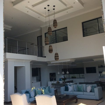 Another view showing the double volume including the beautiful light fittings ma