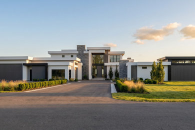 Example of a trendy multicolored one-story exterior home design in Toronto
