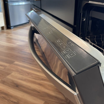 Angled Kitchen Design with Slab Style Cabinets in Pecan Stain