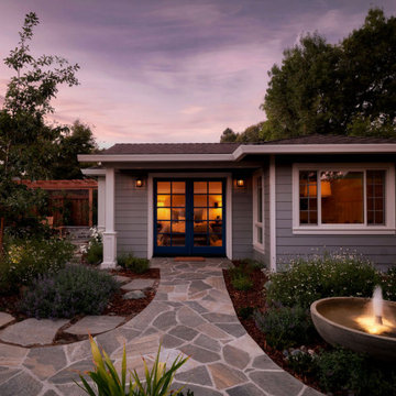 Traditional Backyard ADU Entry with Stone Pathway