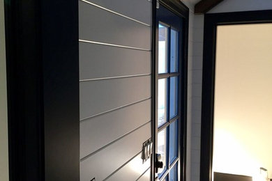 Example of a cottage entryway design in Boston