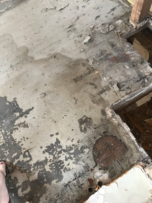 Hardwood Oak Floor under probable asbestos