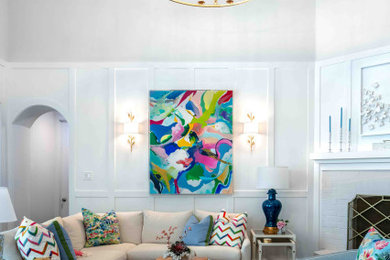 Mid-sized transitional open concept porcelain tile and wall paneling family room photo in Houston with white walls, a standard fireplace and a brick fireplace
