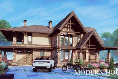 Пример оригинального дизайна: двухэтажный, бежевый дом среднего размера в стиле ретро с облицовкой из камня, вальмовой крышей, крышей из гибкой черепицы и коричневой крышей
