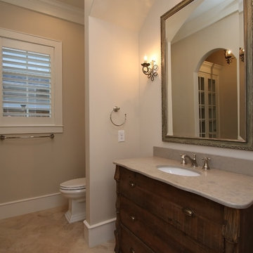 Stone and Cedar Shake come together for this Southern Living Style home