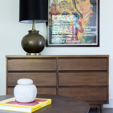 Vintage Bollywood Poster with Mid Century Modern Dresser and Brass Lamp