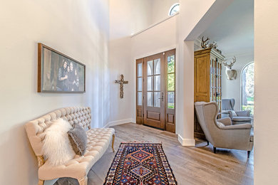 Inspiration for a transitional entryway remodel in Houston