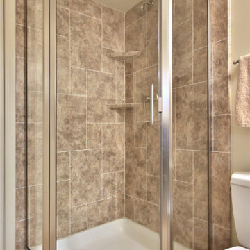 Brecchia NeoAngle shower w/ Windmill Simulated tile