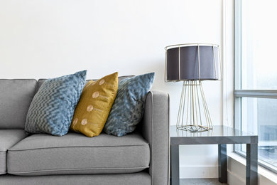 Example of a mid-sized transitional living room design in Toronto with white walls