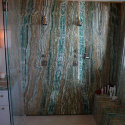 Onice Verde Esmeraldo book matched shower wall. - Products