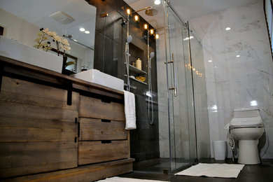 Photo of a mid-sized contemporary master bathroom in Boston with furniture-like cabinets.