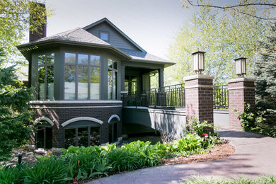 Example of an arts and crafts exterior home design in Cedar Rapids