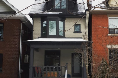 Inspiration for a transitional exterior home remodel in Toronto