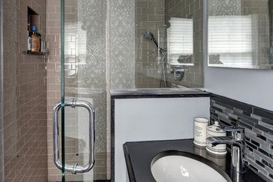 Small transitional master beige tile and matchstick tile slate floor walk-in shower photo in New York with a drop-in sink, flat-panel cabinets, distressed cabinets, quartz countertops, a one-piece toilet and gray walls