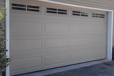 Inspiration for a large timeless two-car garage remodel