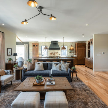 Open-Concept Living Room & Kitchen with Light Hardwood Floors