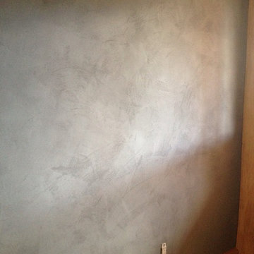 Log cabin Master Bedroom in Bragg Creek done In American Clay Natural Plaster