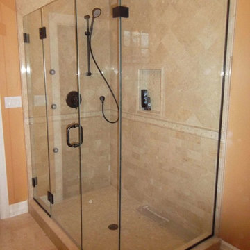 Corner Frameless Shower Enclosure with Oil Rubbed Bronze Hardware
