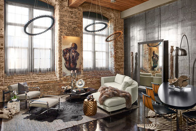Living room - mid-sized industrial formal and open concept black floor and concrete floor living room idea in Atlanta with gray walls