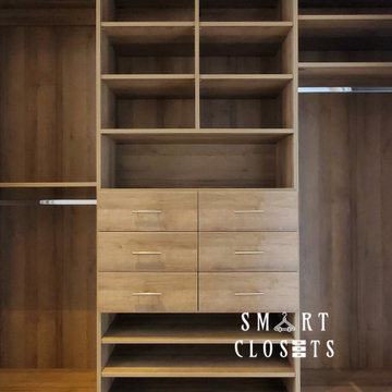 Master Walk In and Wall Unit Closet in Esterel Finish Designed by Smart Closets