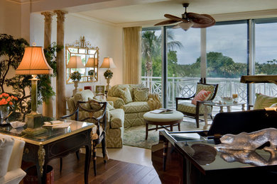 Living room - mid-sized traditional open concept dark wood floor and brown floor living room idea in Miami with beige walls and no fireplace