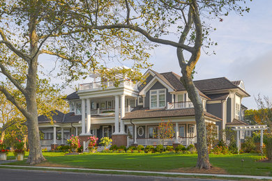 Beach style home design photo in New York