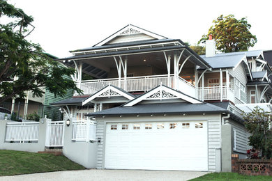 Photo of a traditional home design in Brisbane.