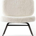 Four Hands - Caleb Chair-ivory Angora - Plush softness meets cool contrast. Slim iron takes on a waxed black tone to frame faux angora fur seating in ivory. The result: a lavishly unique spin on the modern accent chair.