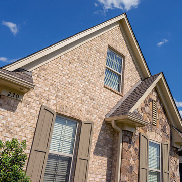 Nottingham Tudor Brick & Tennessee Fieldstone Rock Home - Tennessee